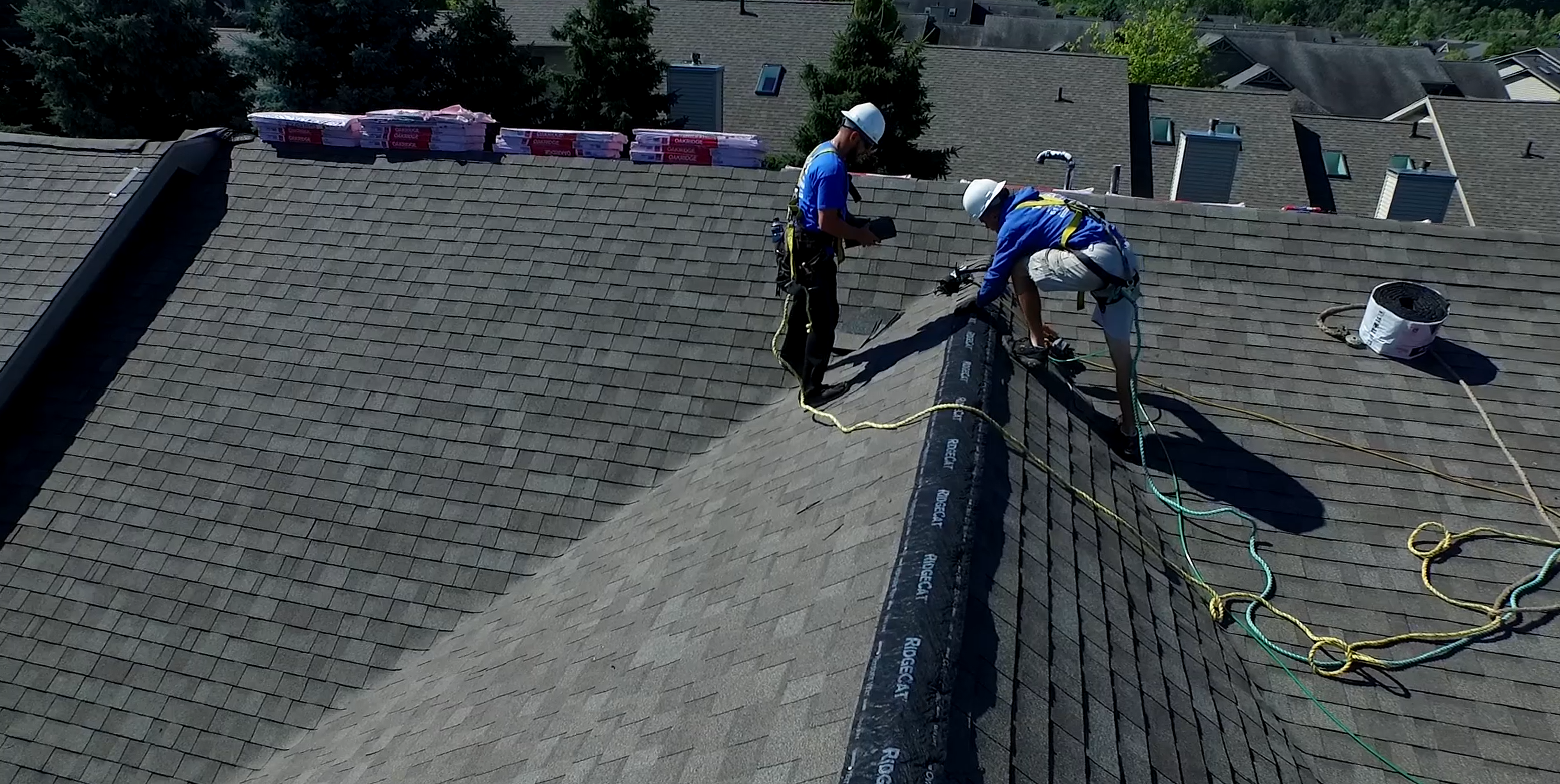 Roofers Repairing a roof